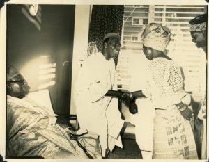Chief Obafemi Awolowo shaking hands hands with  with Mrs Katsina Majekodunmi
